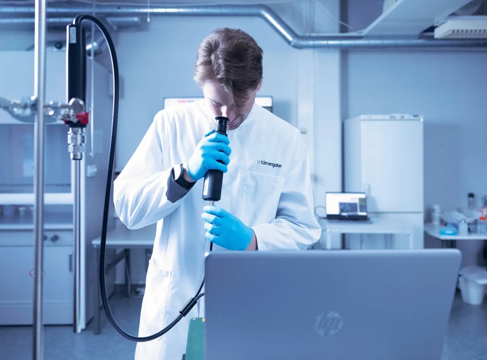 scientist-checking-probe-fibers scientist-checking-probe-fibers